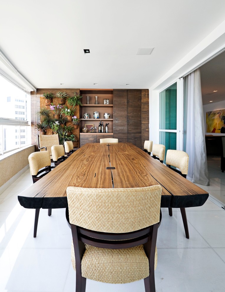 Photo of a contemporary separate dining room in Other with white walls.
