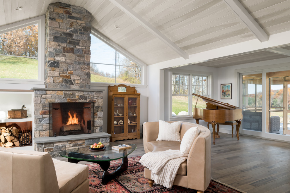 Design ideas for a large country open plan games room in Burlington with a music area, a standard fireplace, a stone fireplace surround and a wood ceiling.