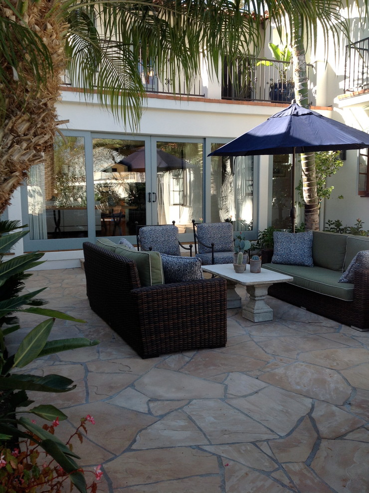 Design ideas for a mediterranean patio in Orange County.