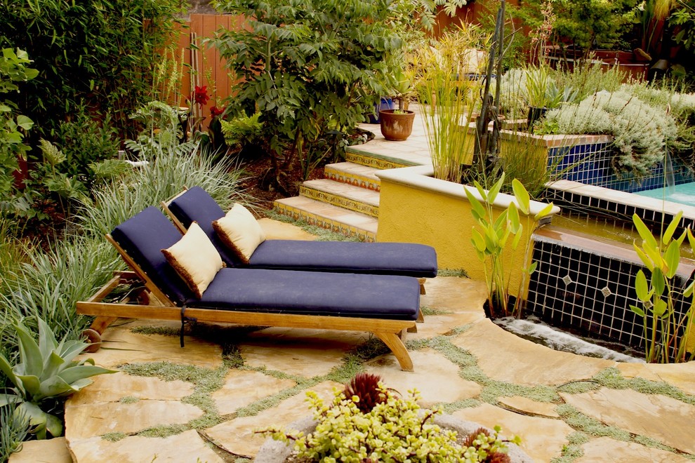 Inspiration for a mediterranean garden in San Luis Obispo with a water feature.