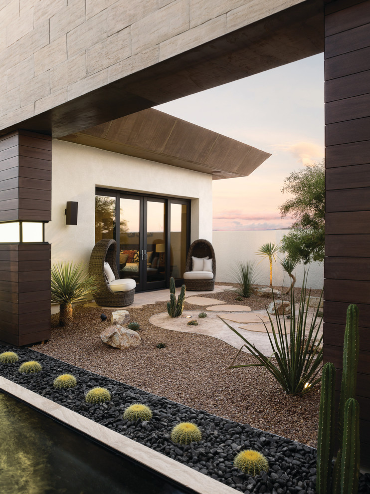 Inspiration for an expansive contemporary backyard patio in Las Vegas with no cover.