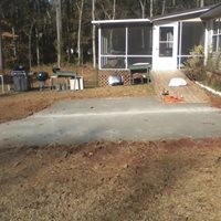 new porches, concrete sidewalk and dock
