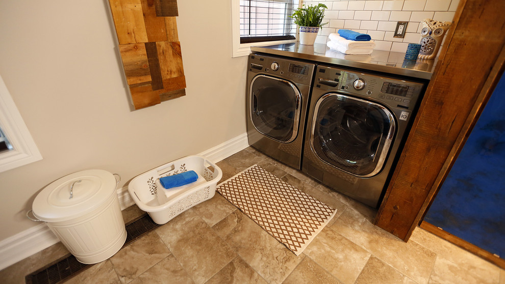 Inspiration for a small transitional ceramic tile mudroom remodel in Toronto with beige walls