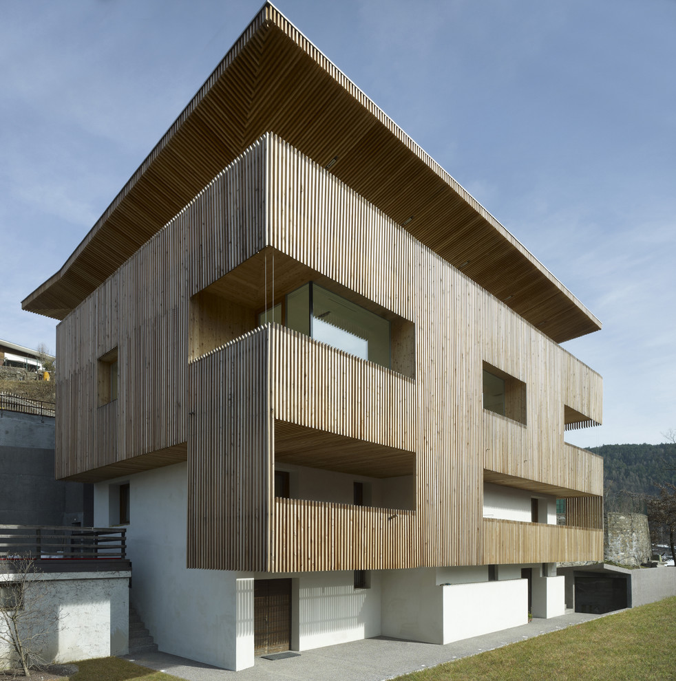 This is an example of a contemporary three-storey exterior in Other.