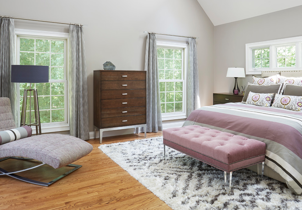 Design ideas for a traditional master bedroom in Chicago with grey walls, medium hardwood floors and no fireplace.