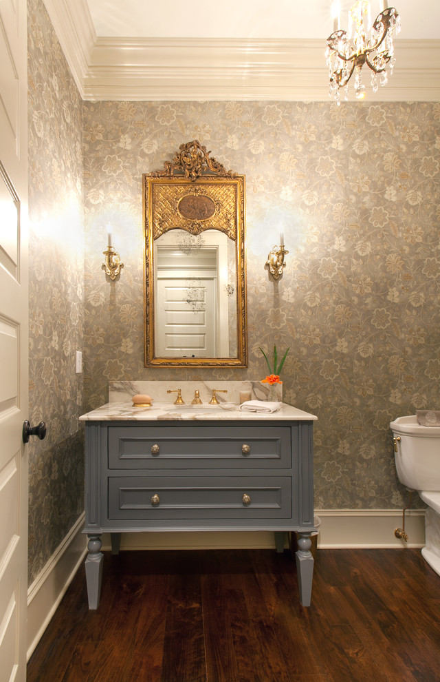 This is an example of a traditional bathroom in Charleston with an undermount sink, grey cabinets and recessed-panel cabinets.