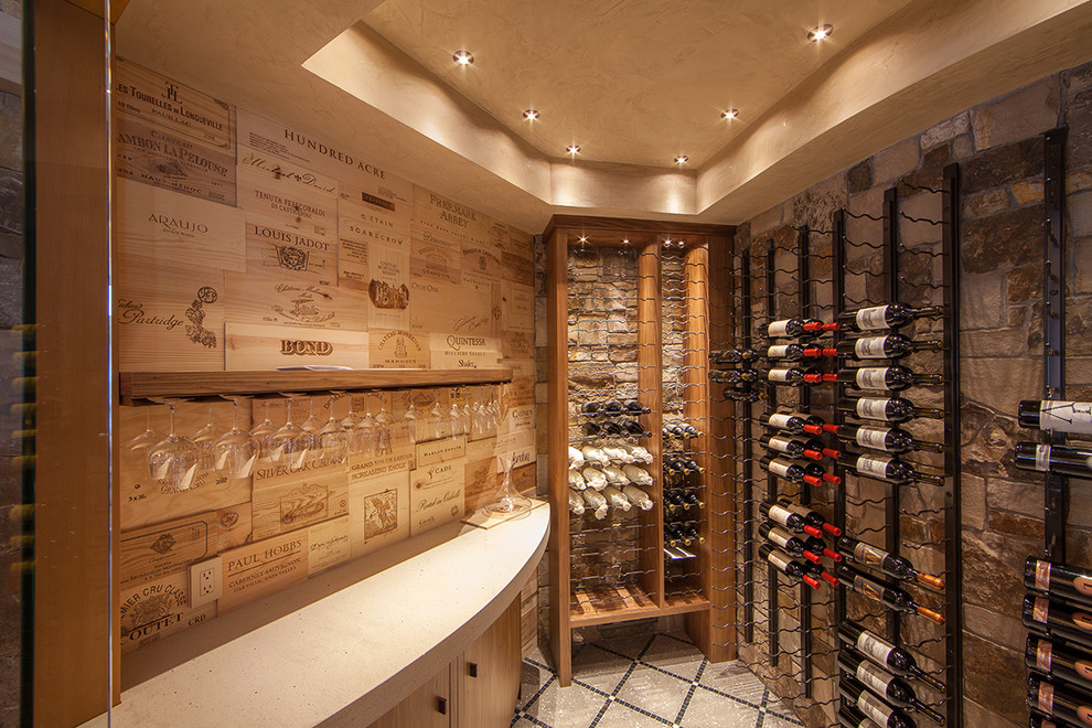 Mediterranean wine cellar in Denver with storage racks.