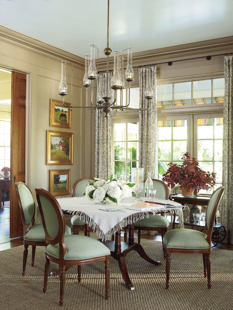 Photo of a mid-sized separate dining room in Atlanta with beige walls and dark hardwood floors.