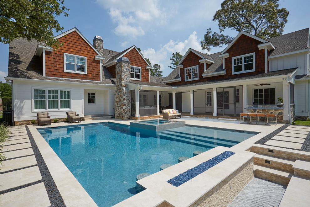 Photo of a large traditional l-shaped pool in Houston.