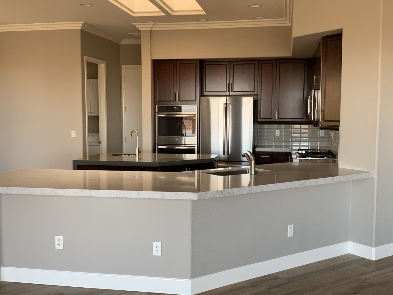 View into kitchen from living room