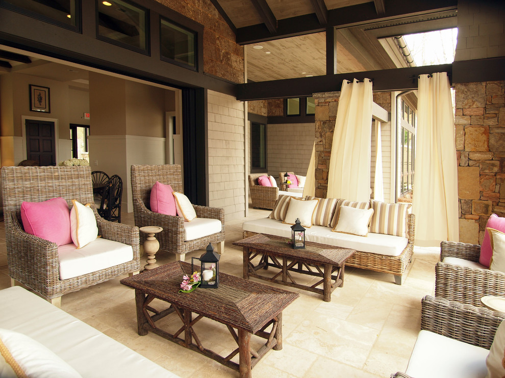 Transitional backyard patio photo with a roof extension
