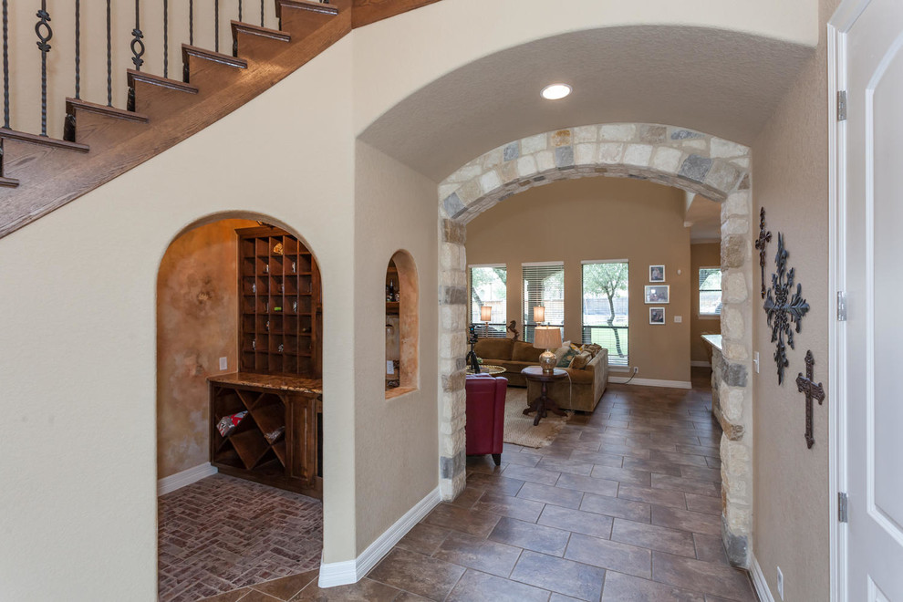 Inspiration for a rustic entryway remodel in Austin