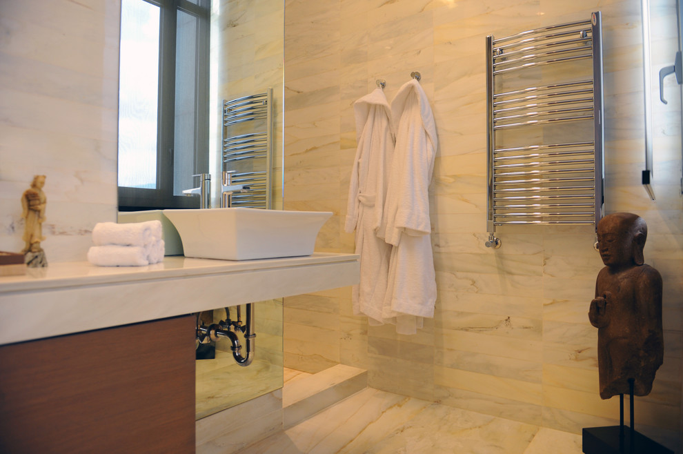 Photo of a contemporary bathroom in Other with a vessel sink, flat-panel cabinets, medium wood cabinets and white tile.