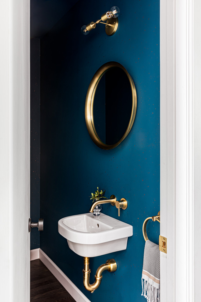 Photo of a small transitional 3/4 bathroom in Austin with blue walls, dark hardwood floors, a wall-mount sink, a single vanity and a floating vanity.