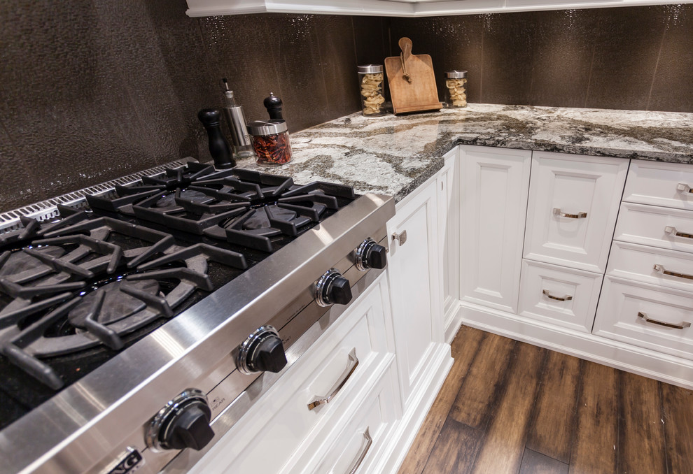 Example of a transitional kitchen design in Toronto