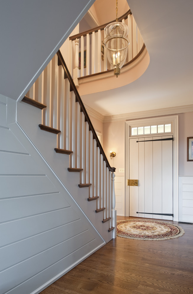 Photo of a traditional entryway in Philadelphia with a single front door, a white front door and medium hardwood floors.