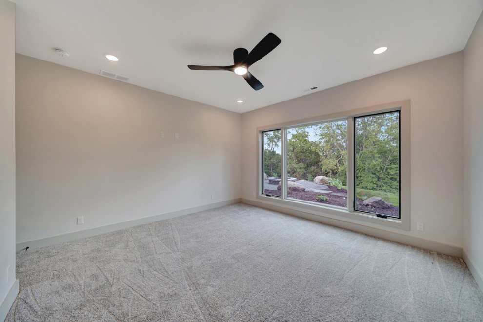 Inspiration for a transitional bedroom remodel in Omaha
