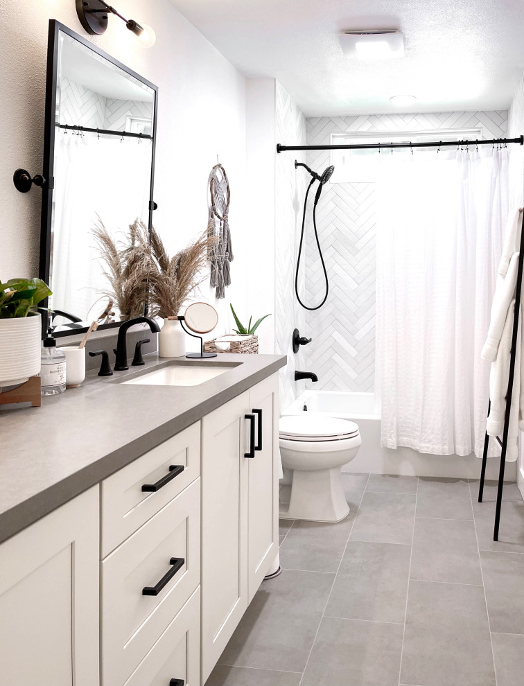 Small modern 3/4 bathroom in Orange County with shaker cabinets, beige cabinets, an alcove tub, beige tile, ceramic tile, engineered quartz benchtops, grey benchtops, a double vanity and a built-in vanity.