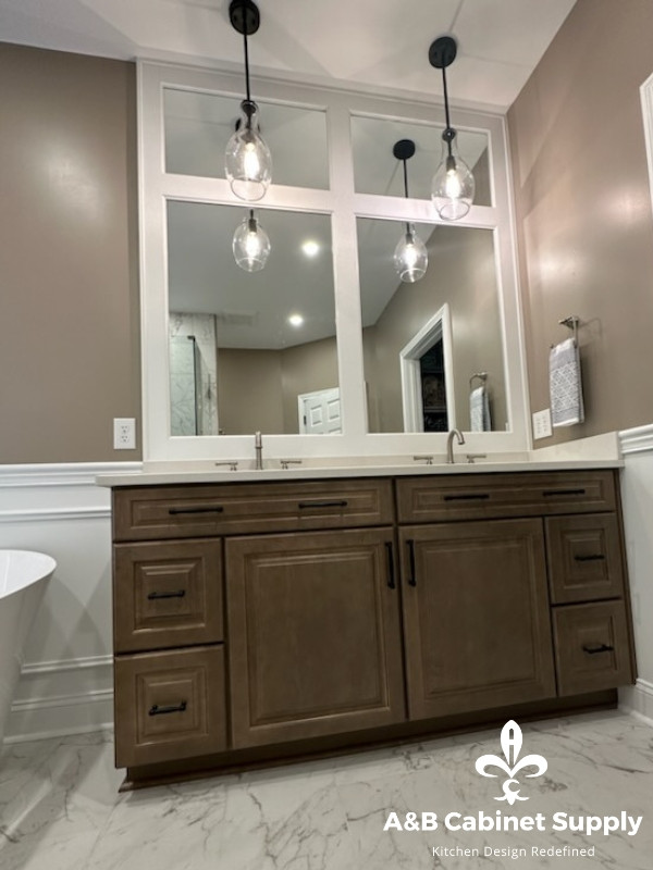 Inspiration for a mid-sized transitional master cement tile floor, multicolored floor and double-sink freestanding bathtub remodel with raised-panel cabinets, medium tone wood cabinets, beige walls, an undermount sink, quartz countertops, white countertops and a built-in vanity