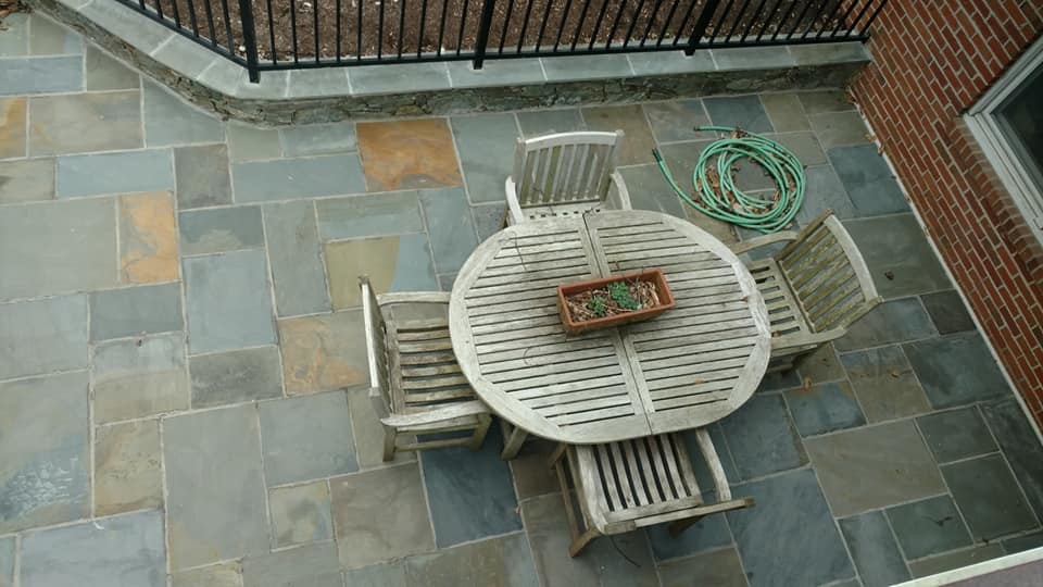 Inspiration for a huge transitional backyard stone and kidney-shaped natural pool remodel