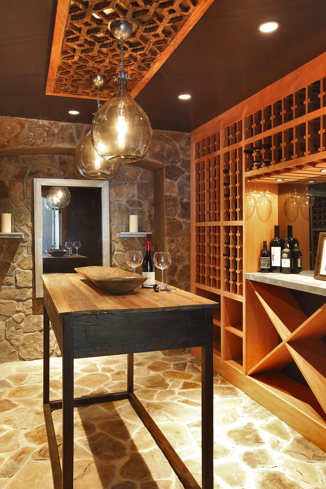 This is an example of a small country wine cellar in New York with storage racks.