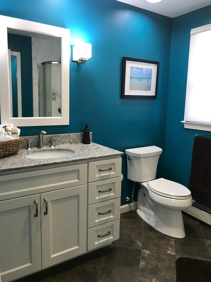 Transitional bathroom in Providence with porcelain floors and brown floor.