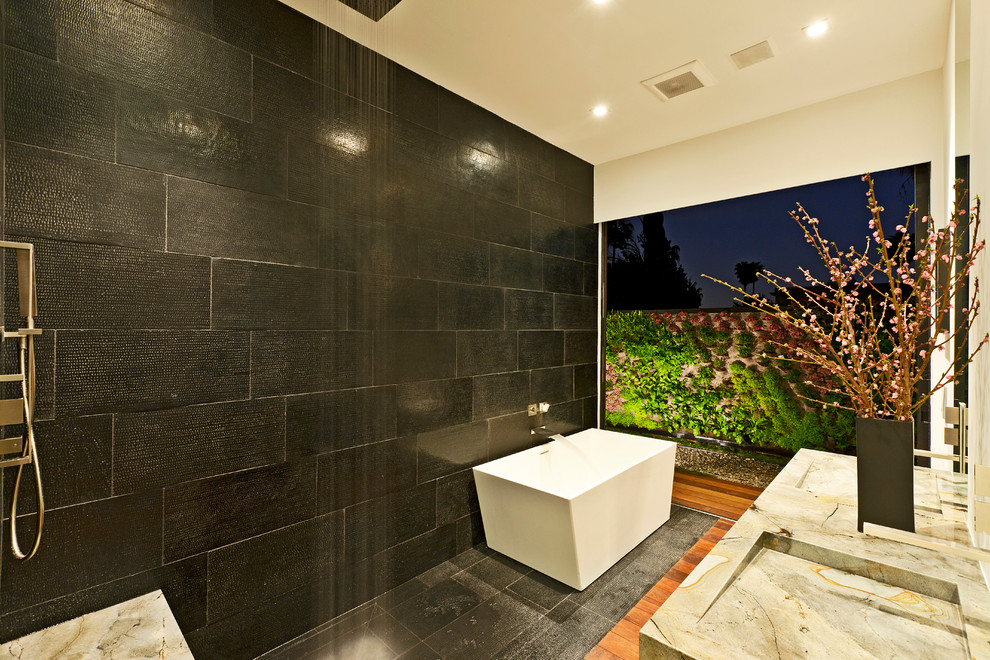 Contemporary bathroom in Los Angeles with an open shower and an open shower.