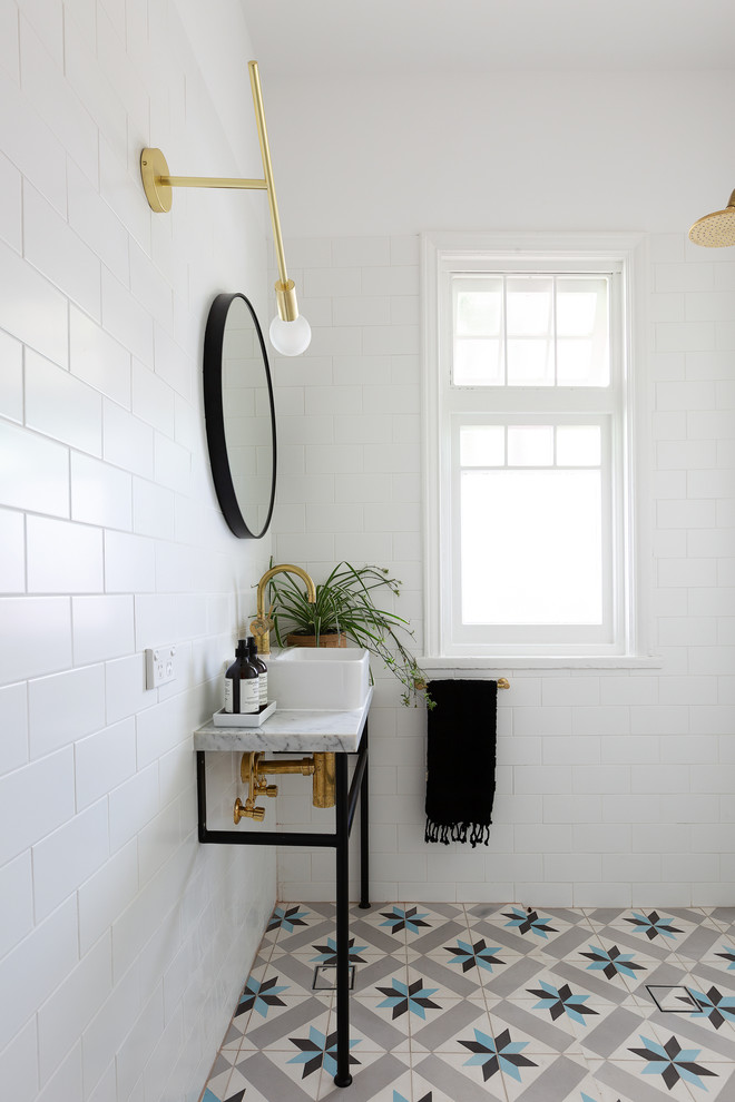 Inspiration for a transitional bathroom in Sydney with a curbless shower, white tile, subway tile, white walls, a vessel sink, multi-coloured floor, an open shower and white benchtops.