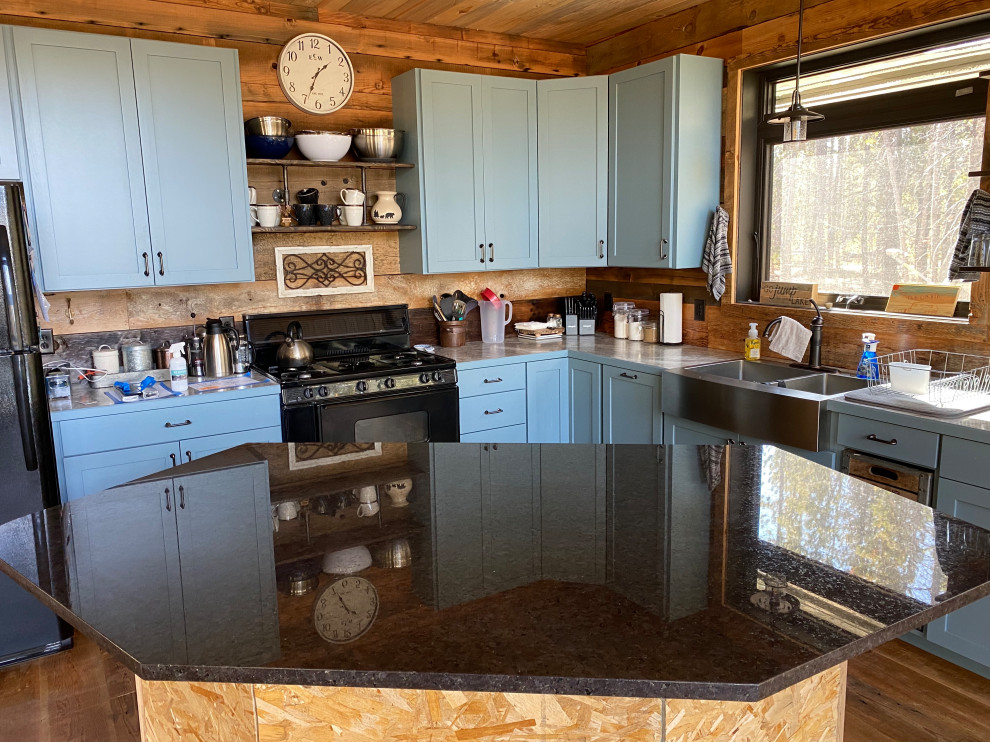 Example of a mountain style kitchen design in Denver