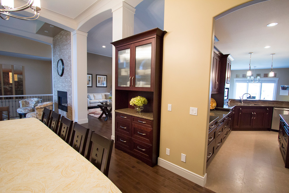 Kitchen/dining room combo - large transitional kitchen/dining room combo idea with yellow walls