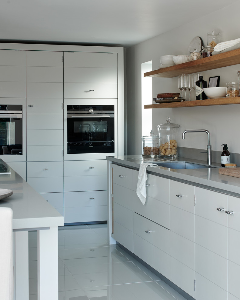 This is an example of a contemporary kitchen in Belfast.