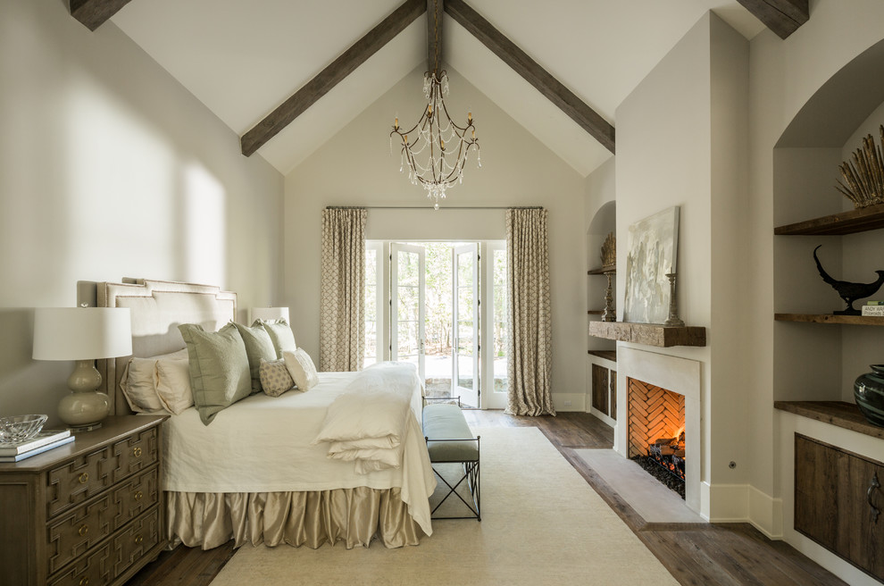 This is an example of a transitional bedroom in Houston.
