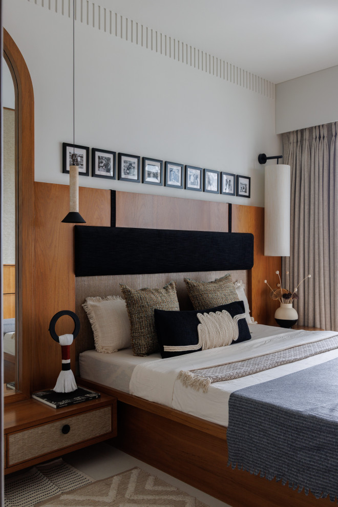 Design ideas for a contemporary bedroom in Mumbai.