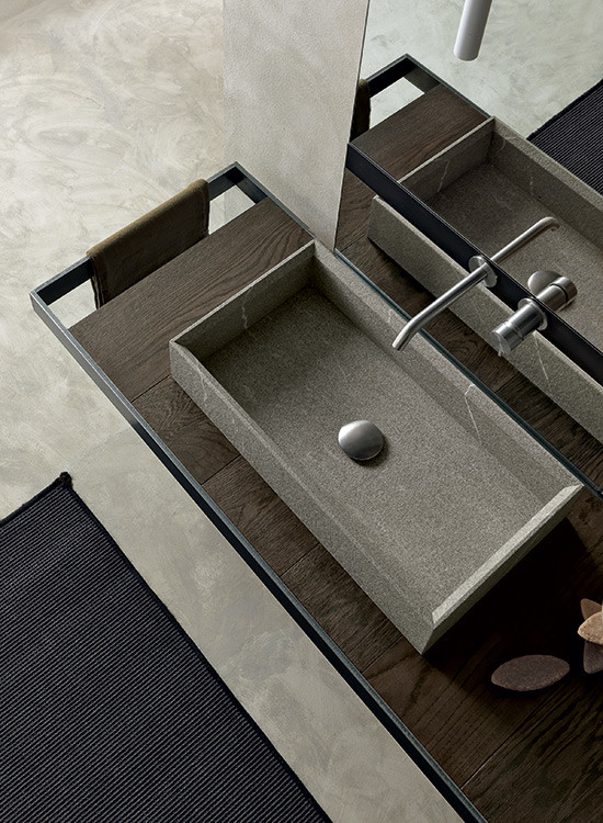 Inspiration for a modern bathroom in Boston with a wall-mount sink.