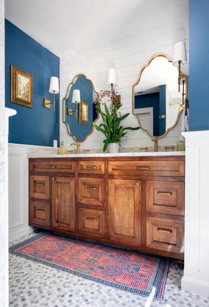 Design ideas for a traditional bathroom in Bridgeport with shaker cabinets, medium wood cabinets, blue walls, mosaic tile floors, an undermount sink, grey floor, white benchtops, a double vanity, a built-in vanity, planked wall panelling and decorative wall panelling.