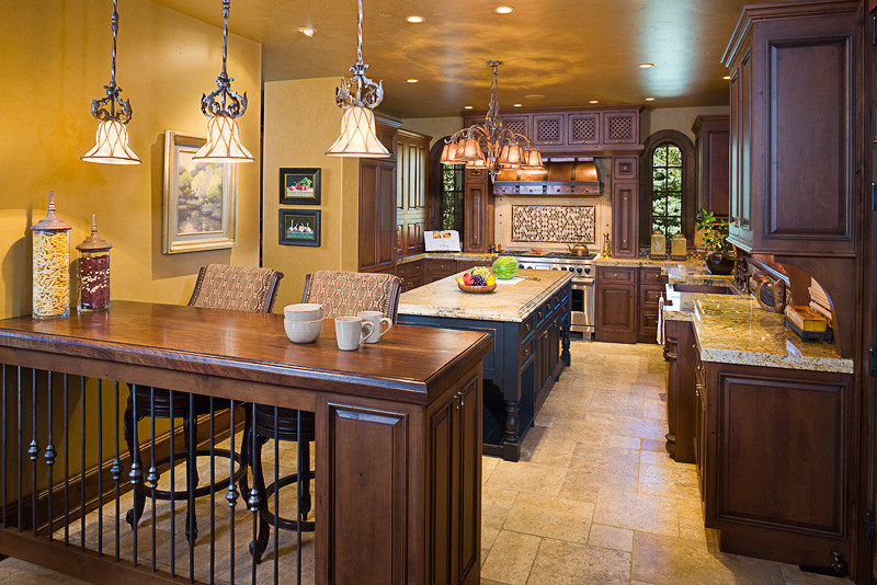 Inspiration for a rustic ceramic tile eat-in kitchen remodel with beaded inset cabinets, dark wood cabinets, marble countertops, paneled appliances and an island
