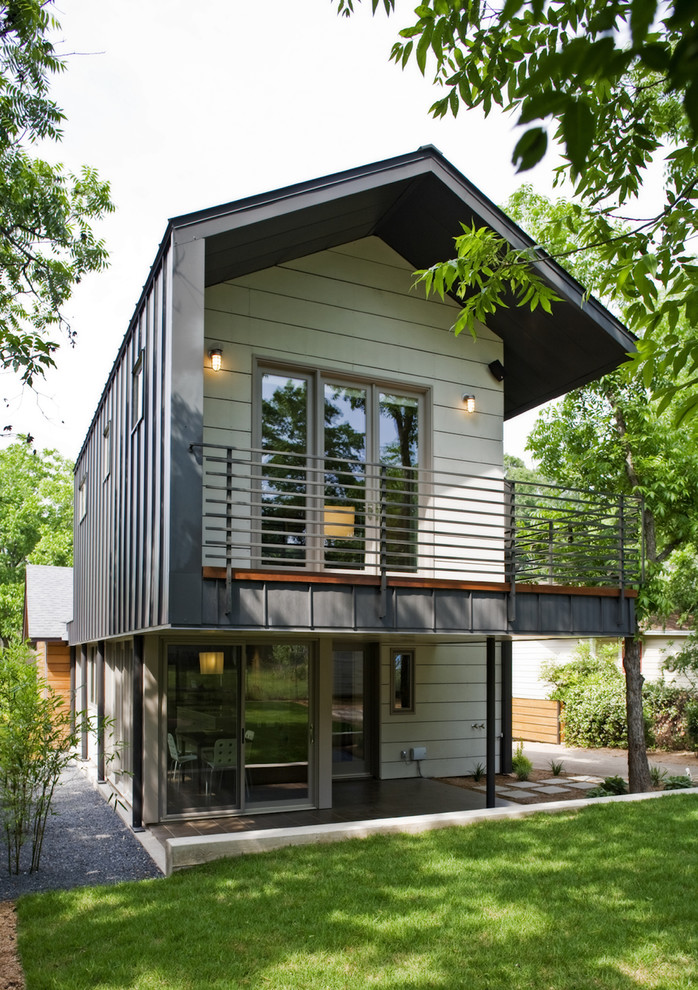 Contemporary exterior in Austin with metal siding and a gable roof.