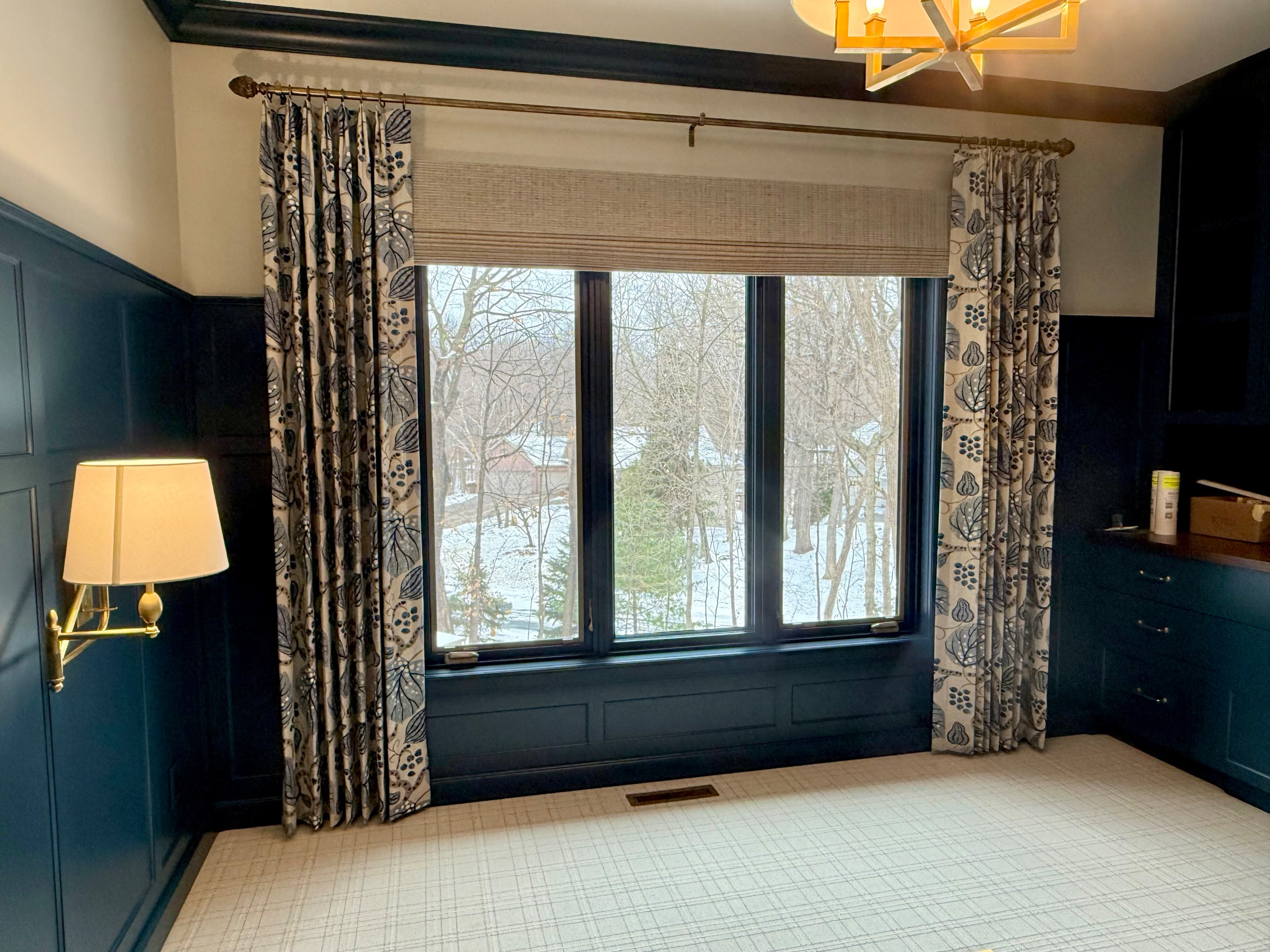 1.5 width stationary panels with Woven Wood shades