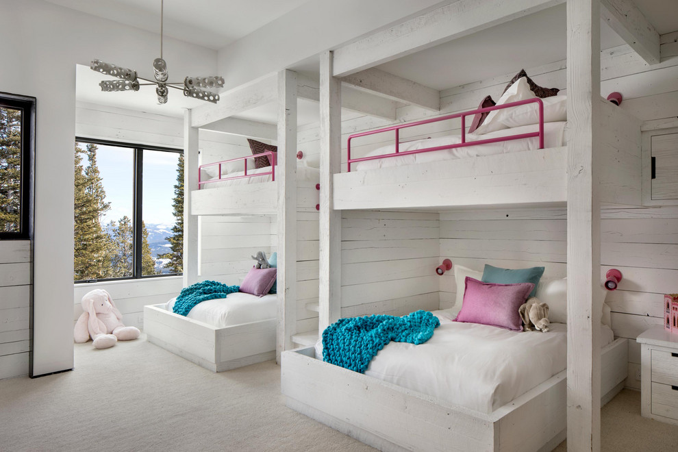 Modern Ski Home - Bedroom mountain style girl carpeted and beige floor kids' bedroom photo with white walls