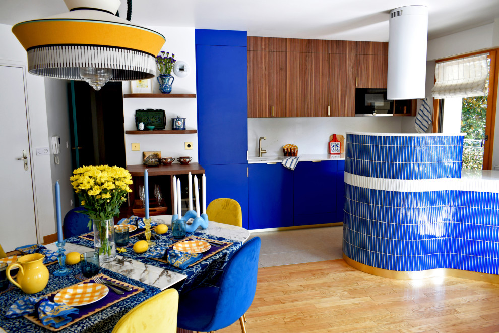 Photo of a mid-sized contemporary kitchen/dining combo in Paris.