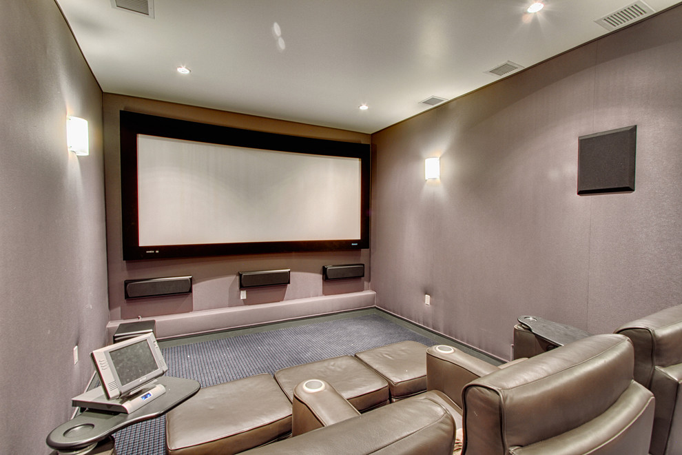 Contemporary enclosed home theatre in Los Angeles with carpet.
