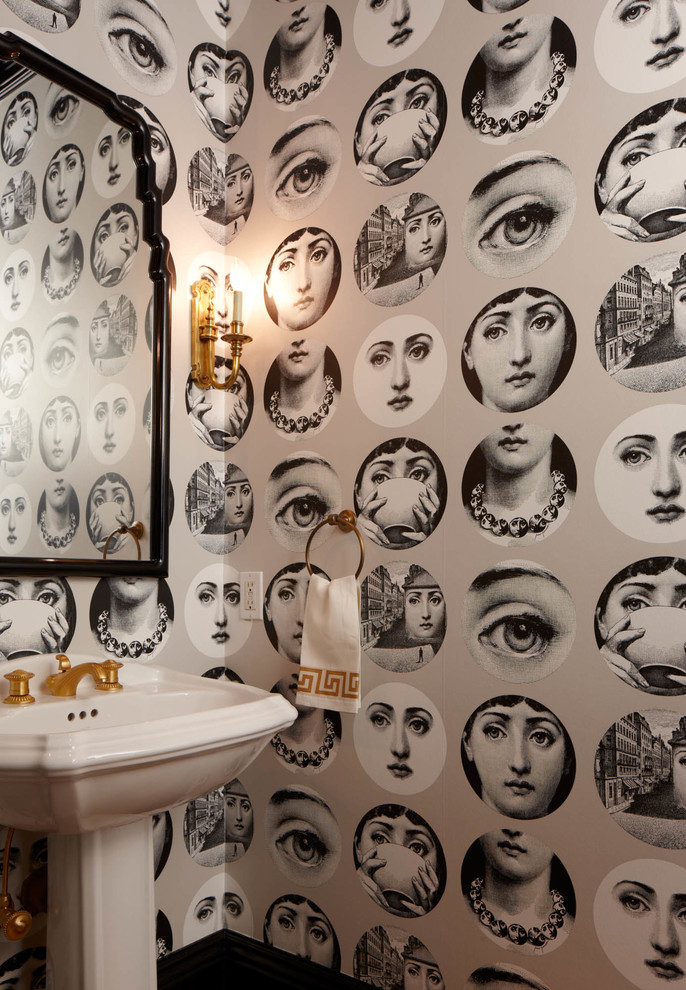 Inspiration for a transitional powder room in Seattle with a pedestal sink and grey walls.