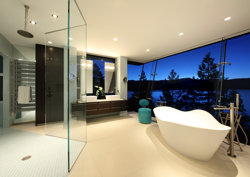 Photo of a contemporary bathroom in Other with a vessel sink, flat-panel cabinets, dark wood cabinets, a freestanding tub, an open shower and an open shower.