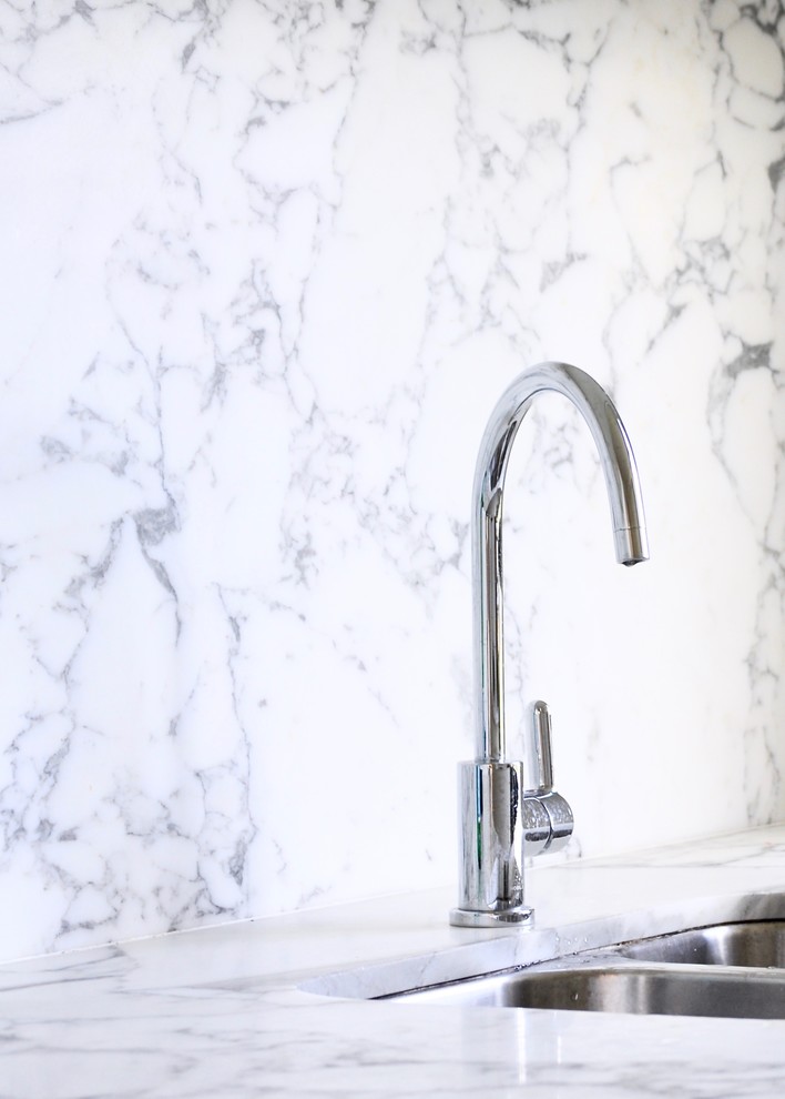 This is an example of a small transitional kitchen in Sydney.