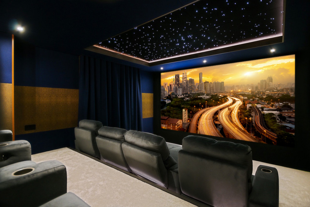 Design ideas for a large modern home cinema in Hertfordshire with a projector screen.