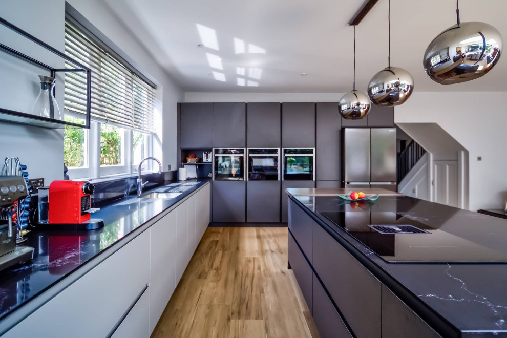 Modern Dark & Dramatic Kitchen in East Sheen - Modern - Kitchen ...