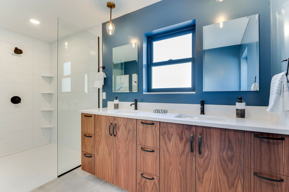 Mid-sized minimalist master vinyl floor, beige floor and double-sink bathroom photo in Minneapolis with flat-panel cabinets, medium tone wood cabinets, a bidet, blue walls, an undermount sink, quartz countertops, white countertops and a floating vanity