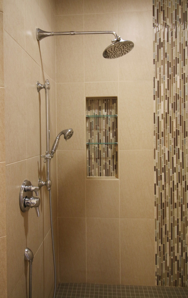Example of a mid-sized transitional master bathroom design in Detroit with raised-panel cabinets