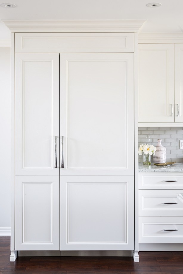 Kitchen - large transitional l-shaped dark wood floor and brown floor kitchen idea in Toronto with a farmhouse sink, shaker cabinets, gray backsplash, ceramic backsplash, stainless steel appliances, an island and white countertops