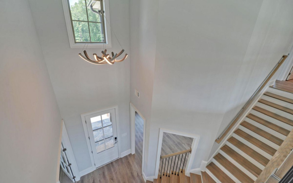 Example of a transitional home design design in Atlanta